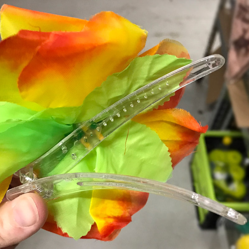 Plast clips på blomst