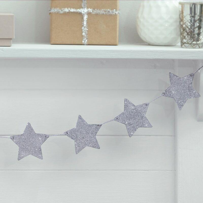 Sølv glitrende guirlande af træstjerner